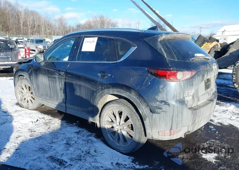 2021 Mazda Cx-5 Grand Touring z USA, uszkodzony, nr VIN JM3KFBDM2M1325837